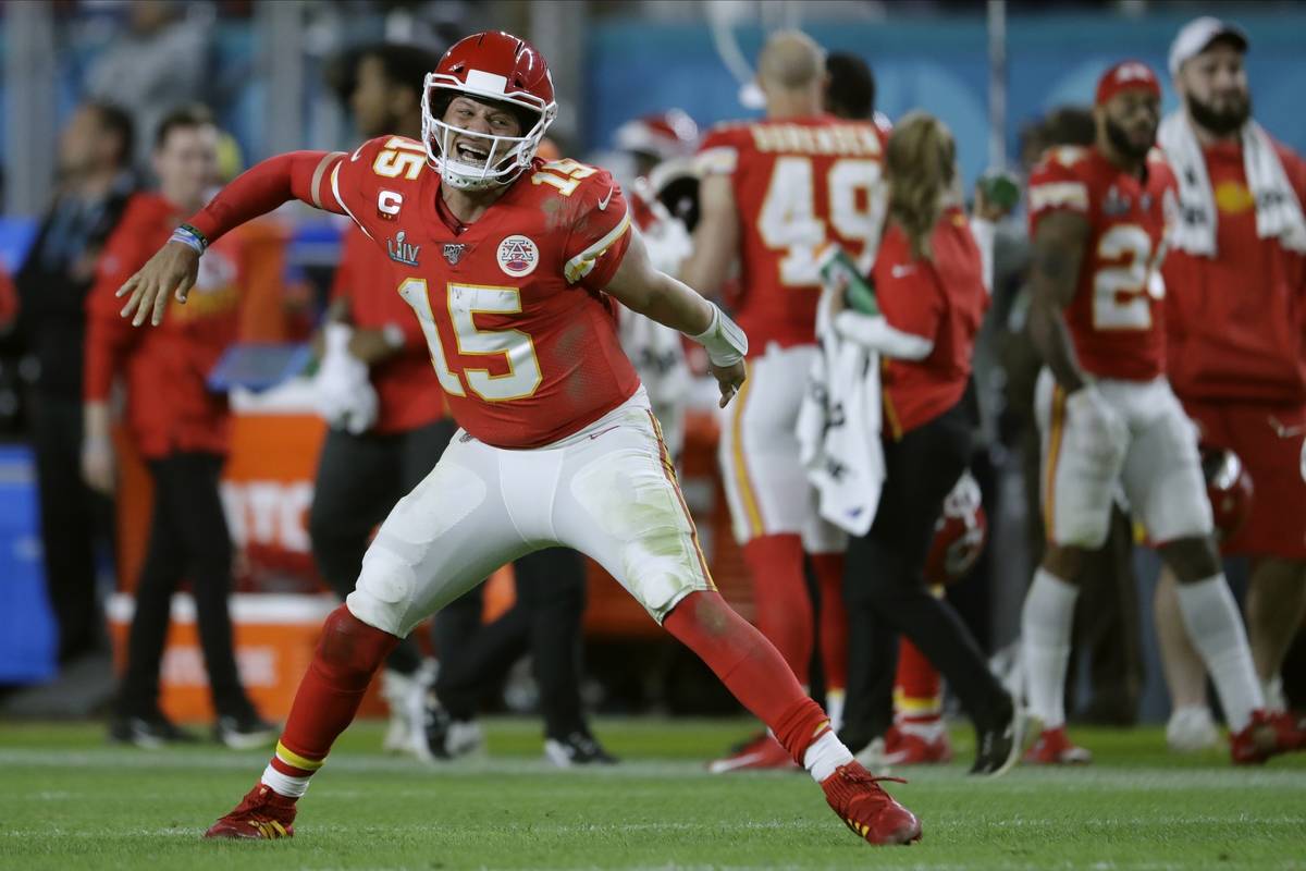 Kansas City Chiefs' quarterback Patrick Mahomes celebrates his touchdown pass to Damien William ...