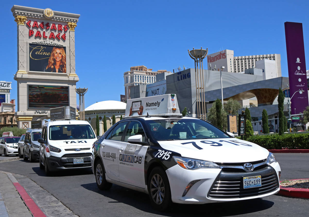 Cab drivers pull into the taxi pick up lane at Caesars Palace in Las Vegas in 2017. (Las Vegas ...