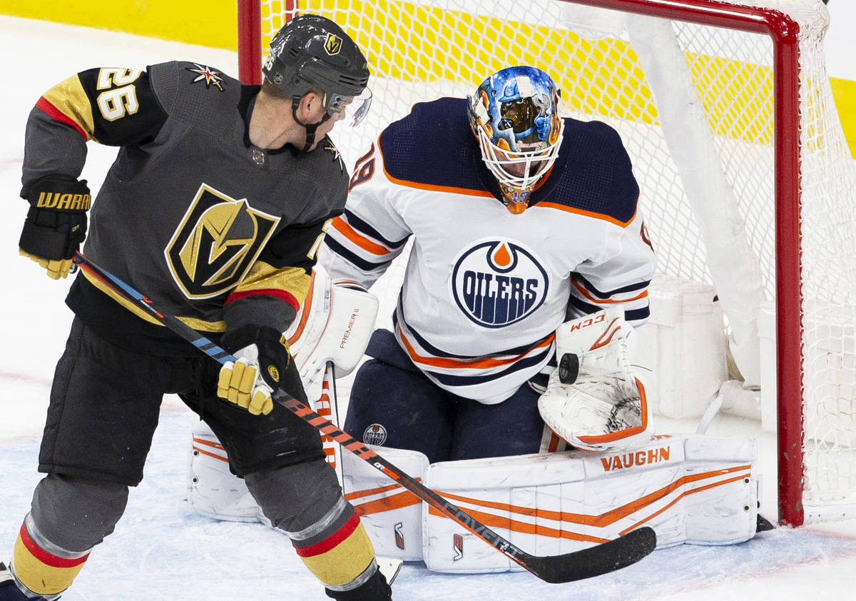 Edmonton Oilers goaltender Mikko Koskinen (19) makes a save against Vegas Golden Knights center ...