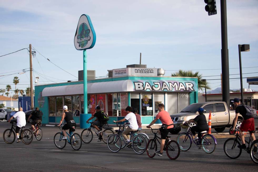 A group of bikers crosses Las Vegas Boulevard headed toward the Strip on Saturday, April 25, 20 ...