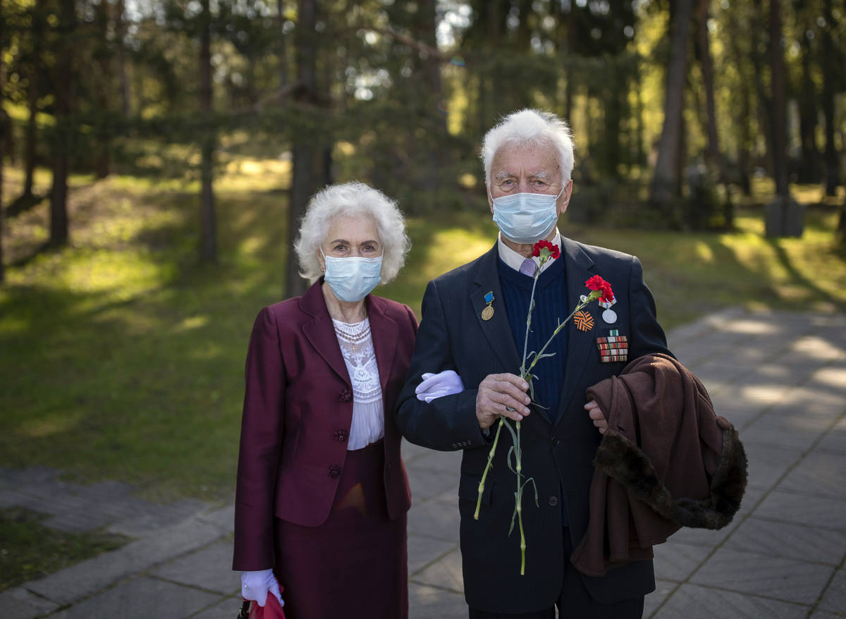 Julius Lionginas Denksnys, an 95 -year-old veteran of World War II and his wife Zita Deksniene, ...