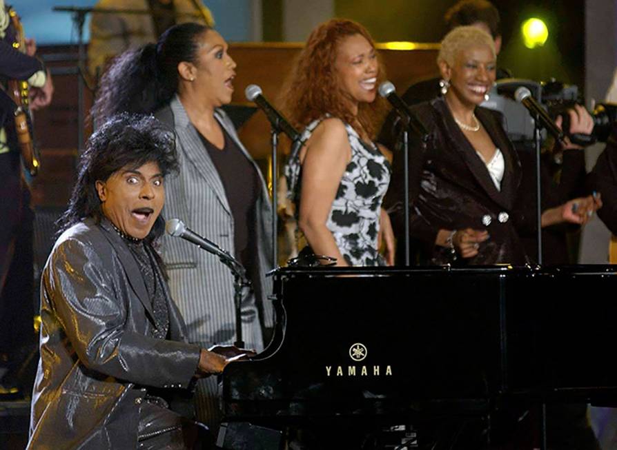 In this April 21, 2002 file photo, Little Richard performs "Good Golly Miss Molly" with the Poi ...