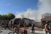 Crews battle a fire Saturday, May 9, 2020, on the 7800 block of Sparkle Avenue in Las Vegas. (L ...