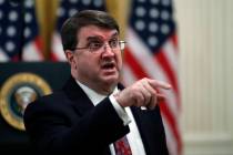 Veterans Affairs Secretary Robert Wilkie talks before President Donald Trump arrives to speak a ...