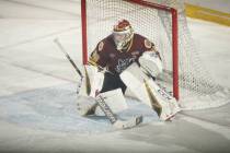 Chicago Wolves goaltender Oscar Dansk defends the net in the second period of Game 4 of the Cal ...