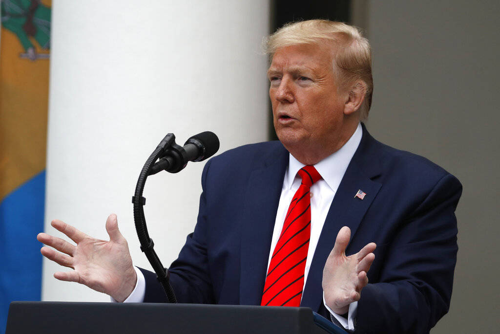 President Donald Trump speaks about the coronavirus during a press briefing in the Rose Garden ...