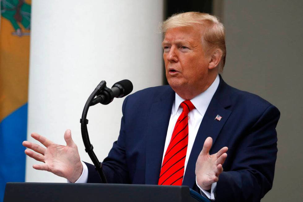 President Donald Trump speaks about the coronavirus during a press briefing in the Rose Garden ...