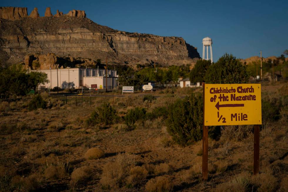 A hand-painted sign points the way to the Chilchinbeto Church of the Nazarene in Chilchinbeto, ...