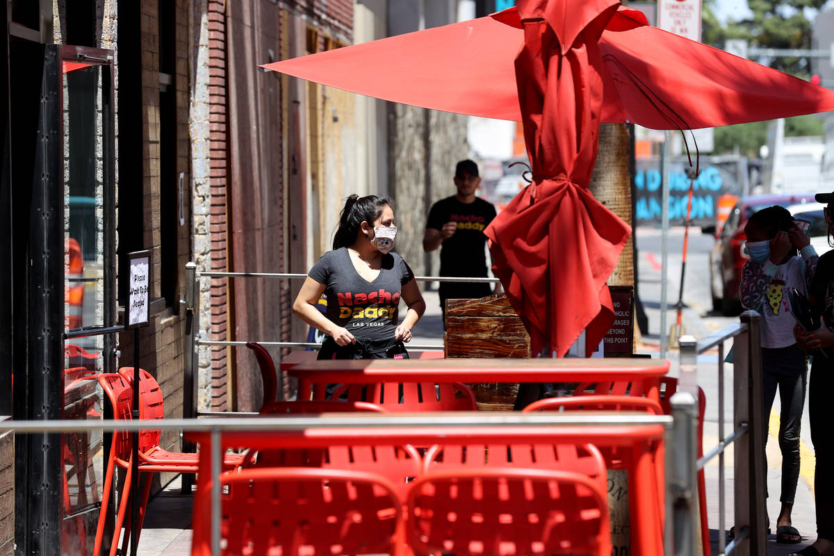 A Nacho Daddy prepares to seat a group at the restaurant on 4th Street in downtown Las Vegas Tu ...