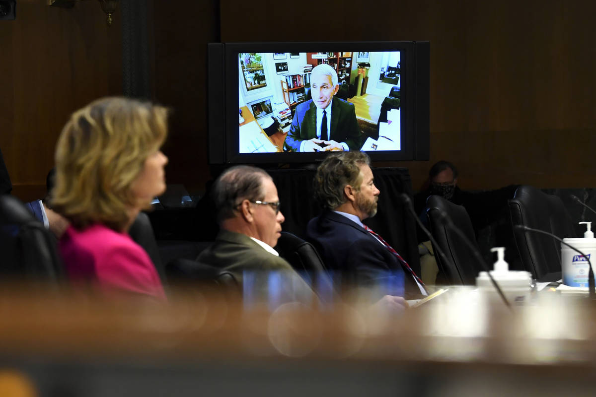 Senators listen as Dr. Anthony Fauci, director of the National Institute of Allergy and Infecti ...