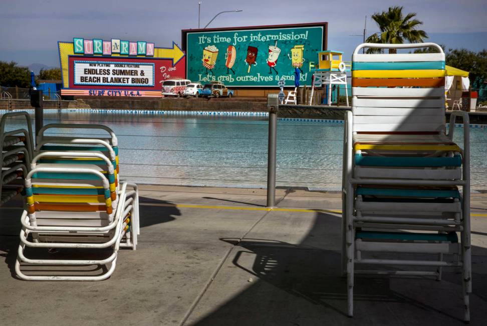 Tables and chairs are being reconfigured about the Surf-A-Rama Wave Pool to allow for social di ...