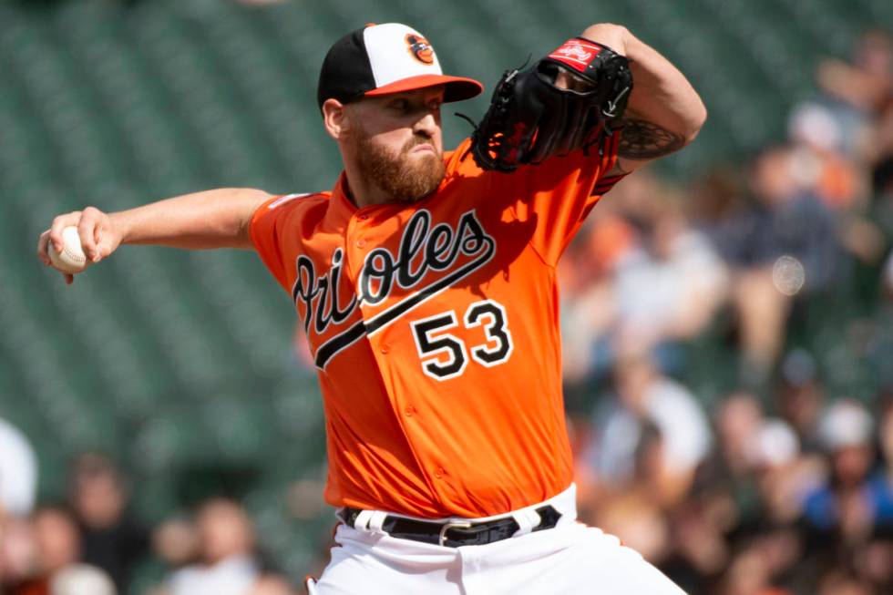 Baltimore Orioles starting pitcher Dan Straily (53) throws in the first inning of a baseball ga ...