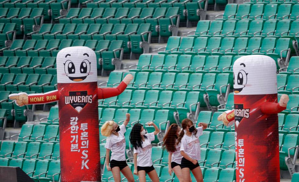 SK Wyverns' cheerleaders cheer for their team during a baseball game between Hanwha Eagles and ...