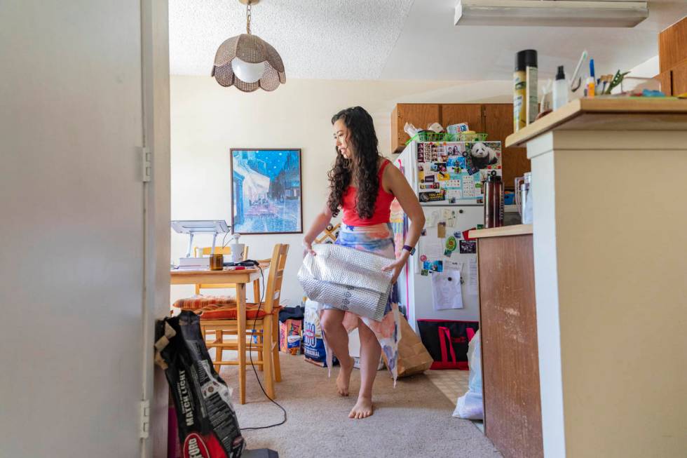 Sam O'Connell packs and cleans her apartment in Las Vegas on Tuesday, May 19, 2020. (Elizabeth ...