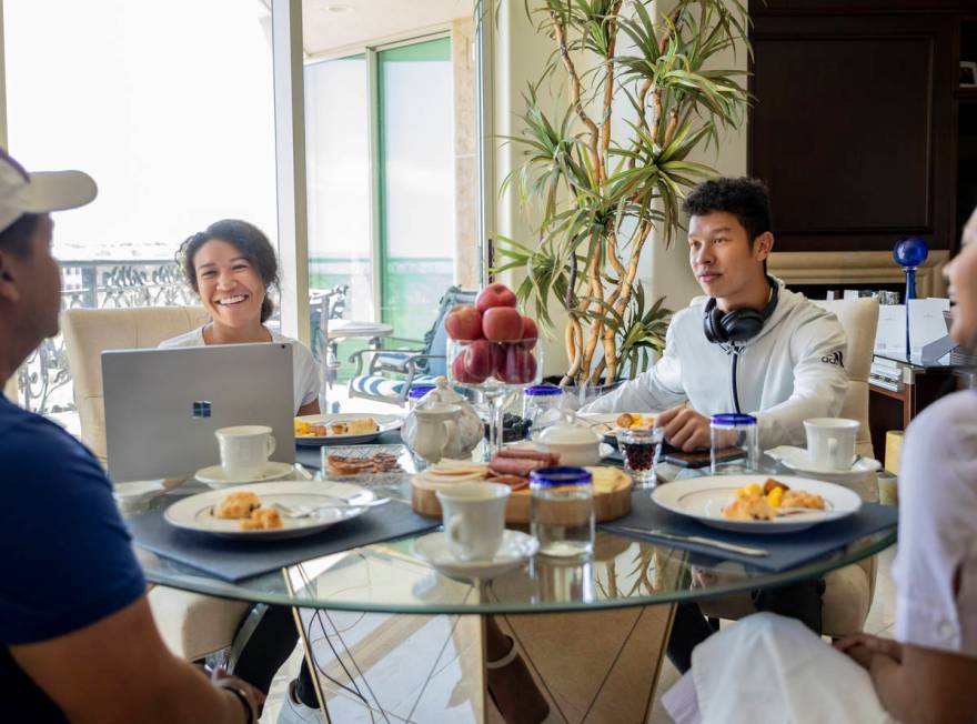 Siblings Amber Williams, left, and Lucas, eat brunch with their father Michael Williams and ste ...