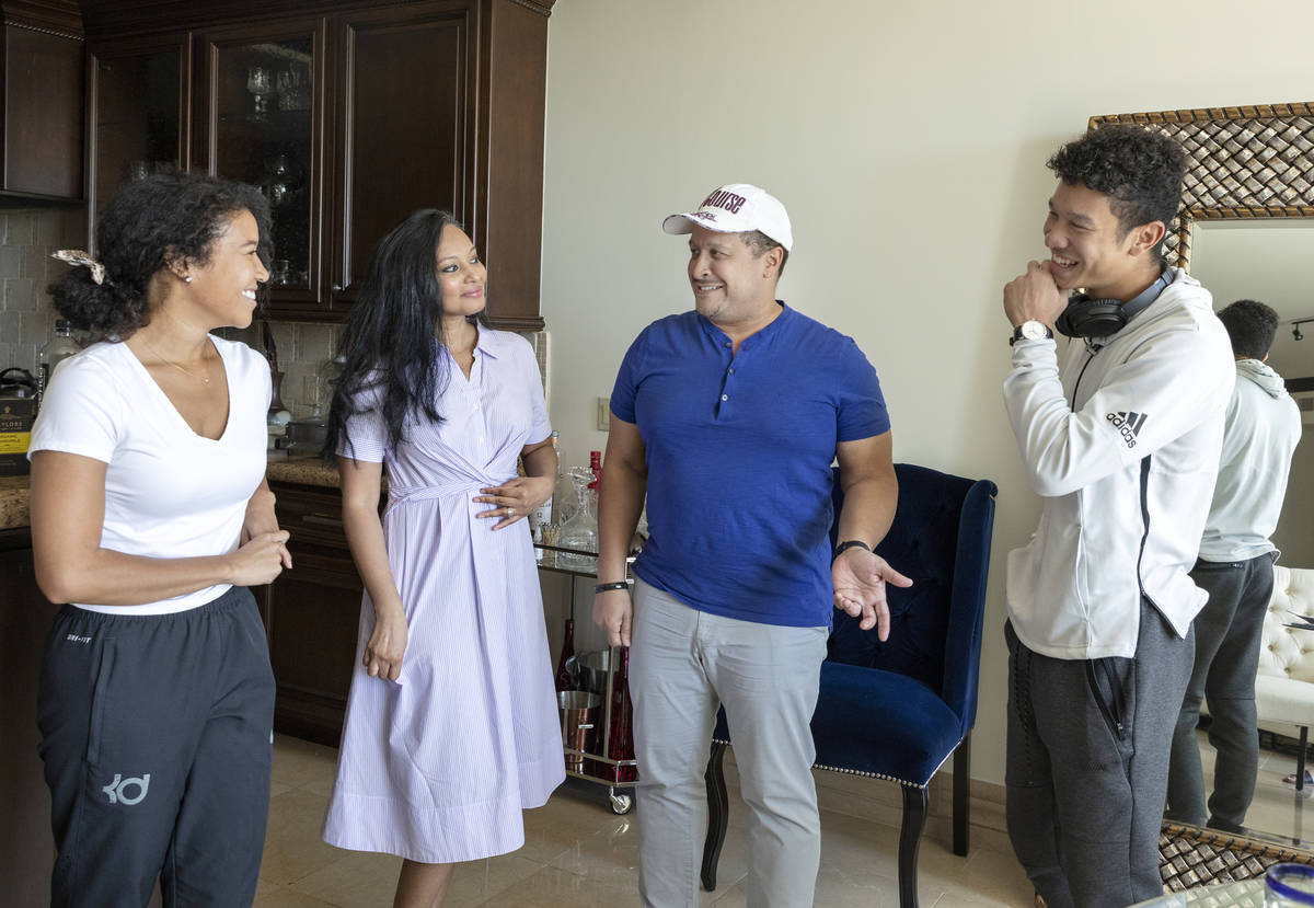 The Williams family from left, Amber, Tanuja, Michael, and Lucas, are photographed in their hom ...