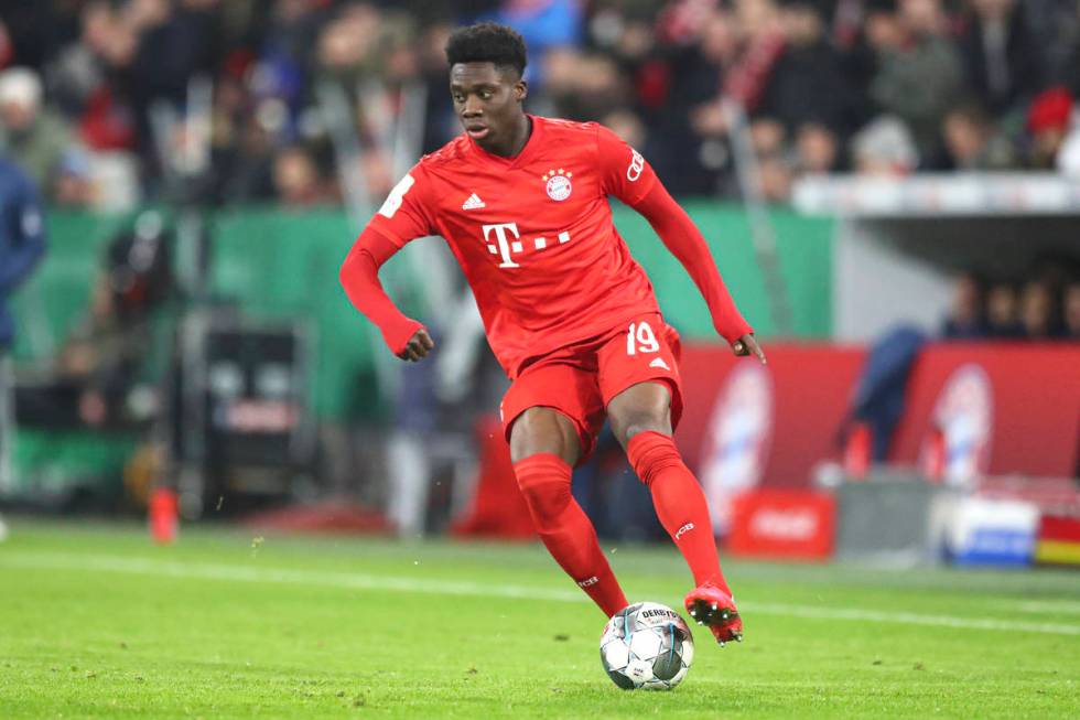 Bayern's Alphonso Davies controls the ball during the German soccer cup, DFB Pokal, match betwe ...