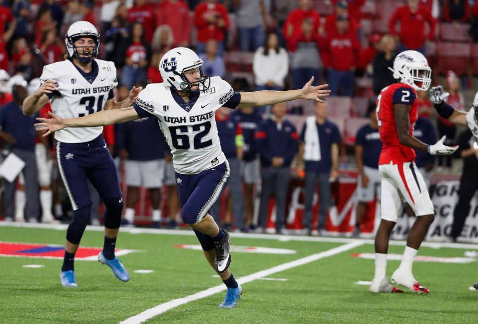 Utah State's Dominik Eberle watches his game-winning field goal against Fresno State during an ...