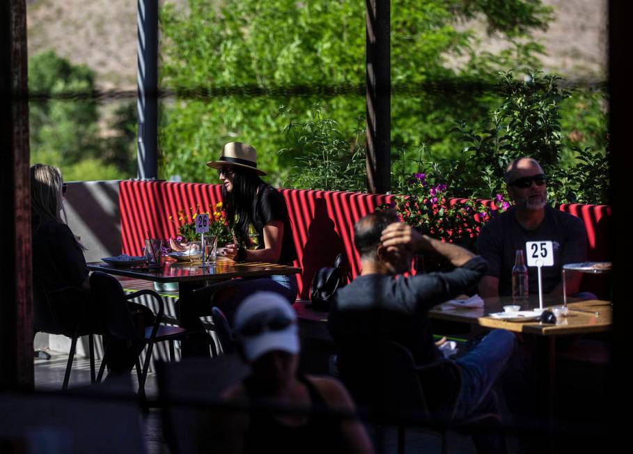 Diners enjoy lunch on the patio at Cottonwood Station in Blue Diamond on Wednesday, May 13, 202 ...