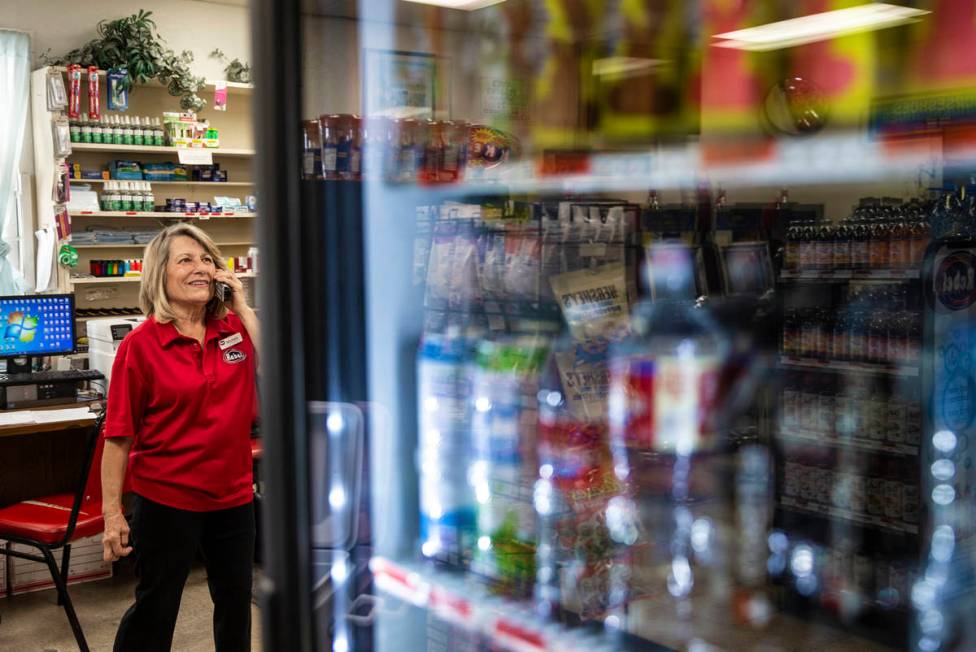 Store clerk Michele Schaffer answers the phone at Village Market Mercantile in Blue Diamond on ...