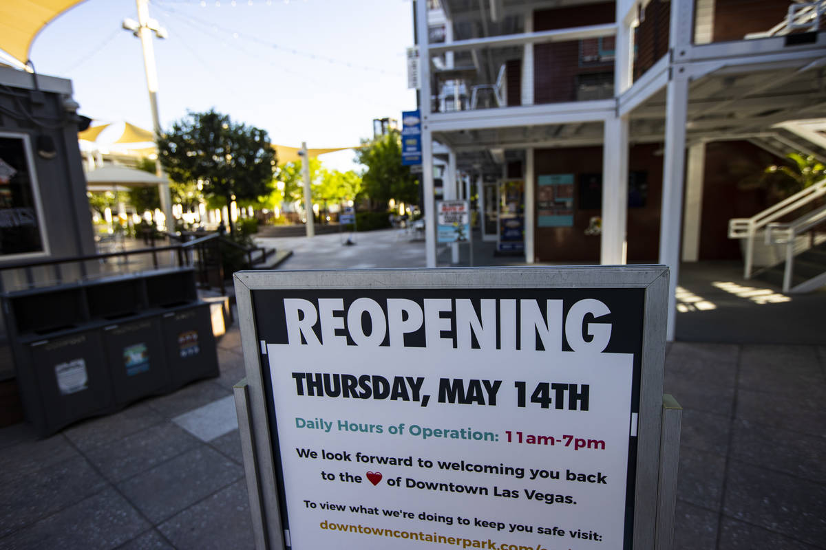 A sign at the Downtown Container Park marks the first day of its reopening in downtown Las Vega ...