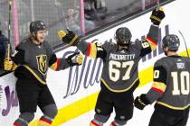 Vegas Golden Knights center William Karlsson (71) celebrates with Vegas Golden Knights left win ...