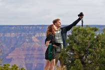 Recent Baylor University graduate Cady Malachowski takes a photo with Andrew Fink at the Grand ...