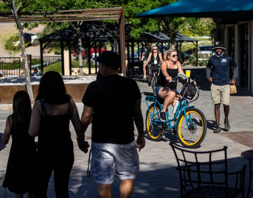 People enjoy the outdoor shops and restaurants at Lake Las Vegas on Friday, May 15, 2020, in He ...