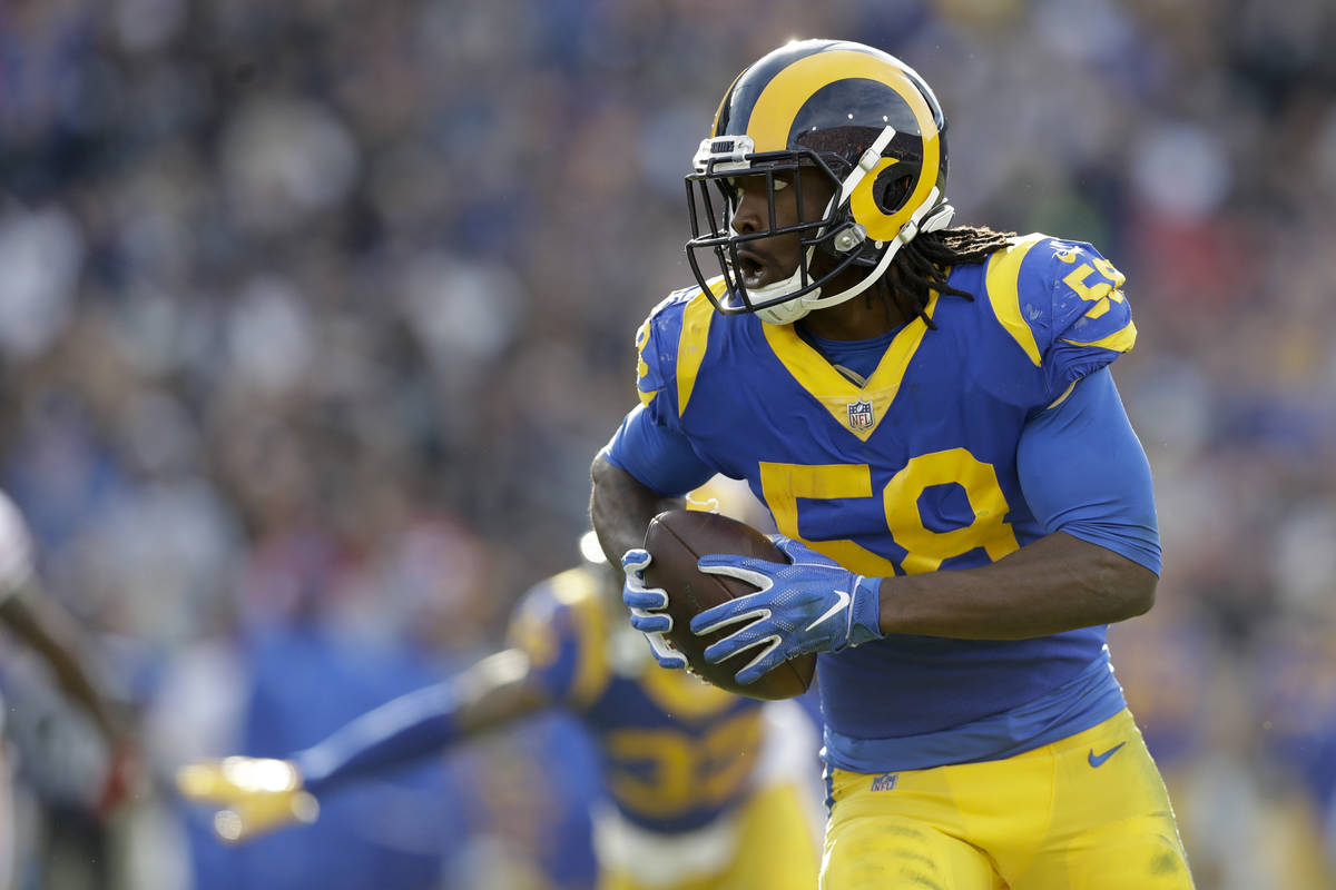 Los Angeles Rams inside linebacker Cory Littleton scores on a interception against the San Fran ...