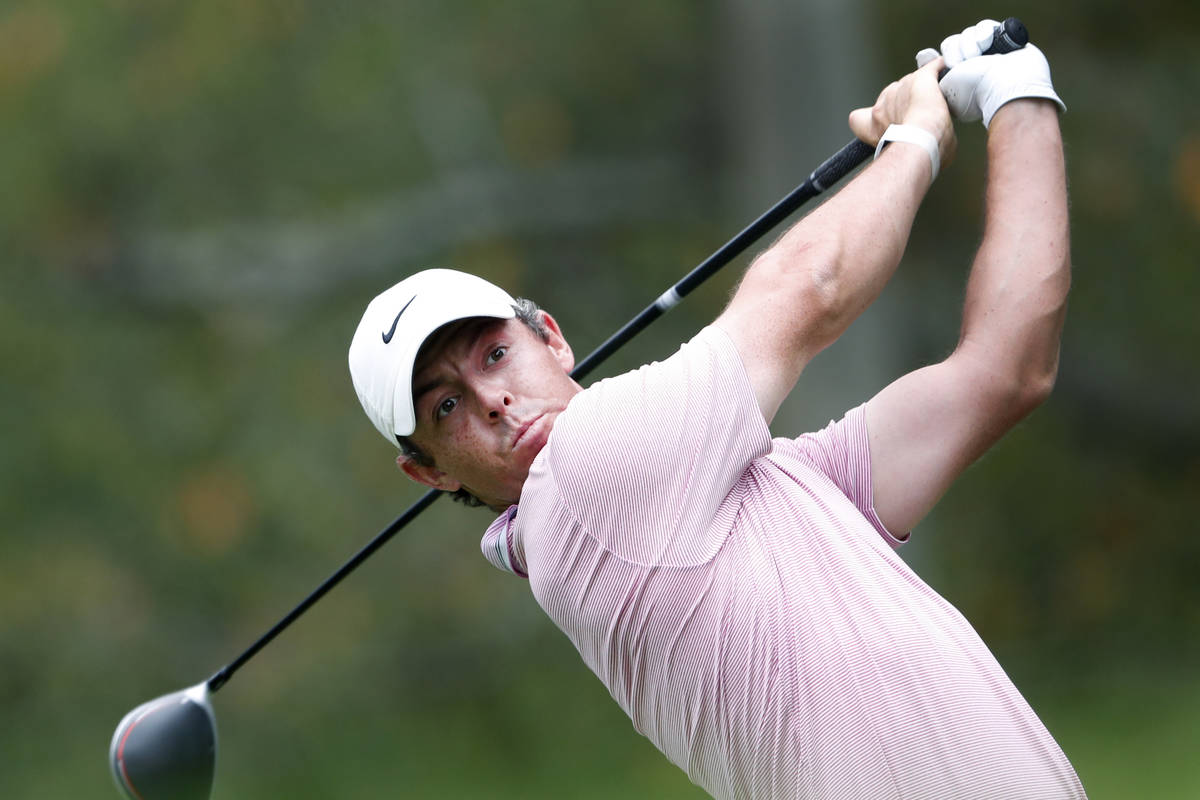 Rory McIlroy hits from the fifth tee during the final round of the Tour Championship golf tourn ...