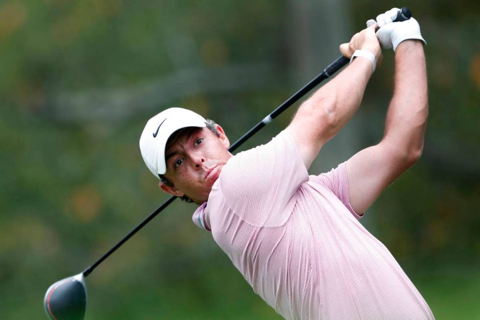 Rory McIlroy hits from the fifth tee during the final round of the Tour Championship golf tourn ...