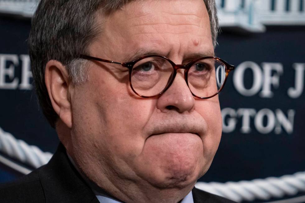 FILE - In this Jan. 13, 2020, file photo Attorney General William Barr speaks to reporters at t ...