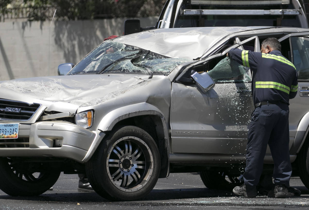 Las Vegas police is investigating a two-vehicle crash that caused one vehicle to flip over at t ...