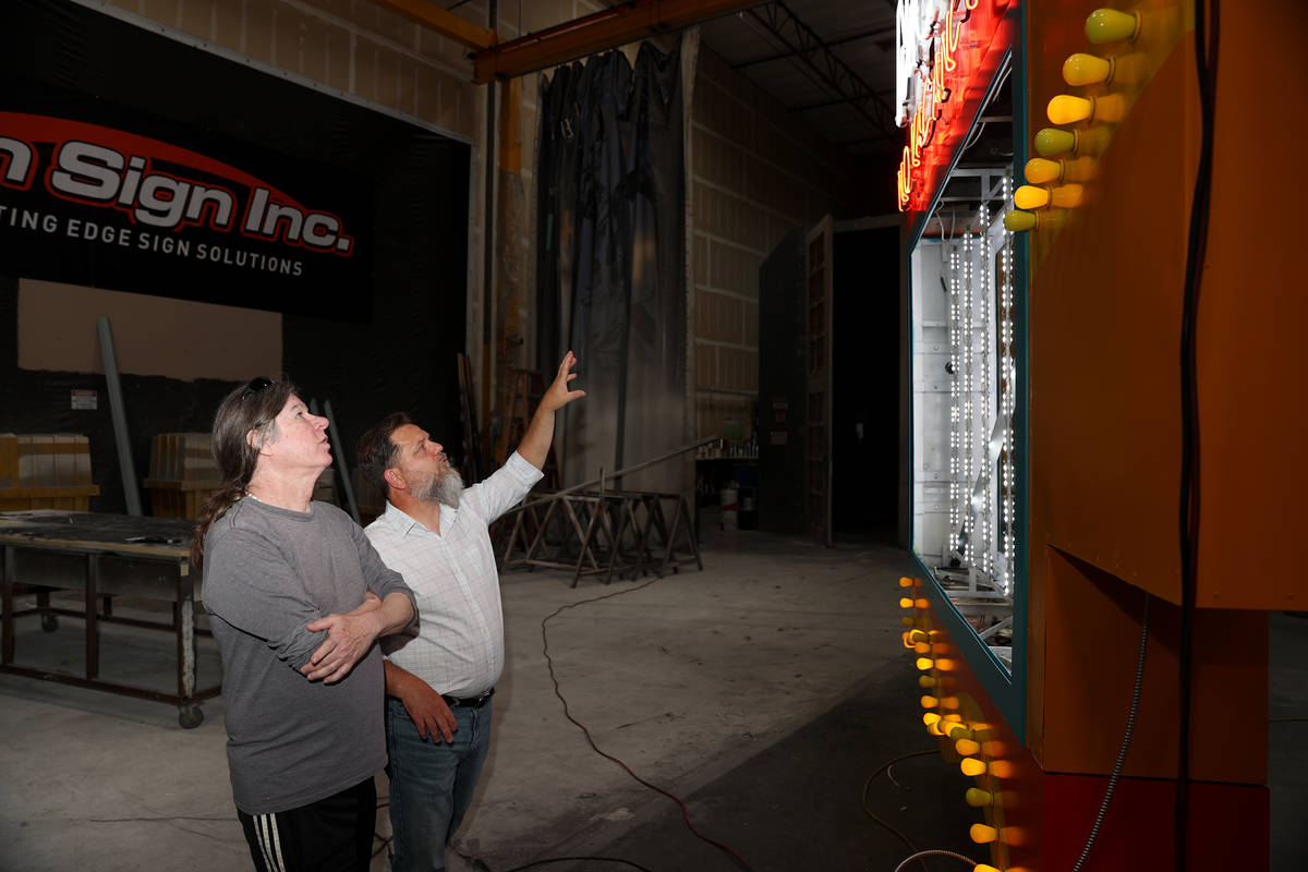 Las Vegas City Attorney Brad Jerbic, left, and Keith Kochan, project director for Vision Sign, ...