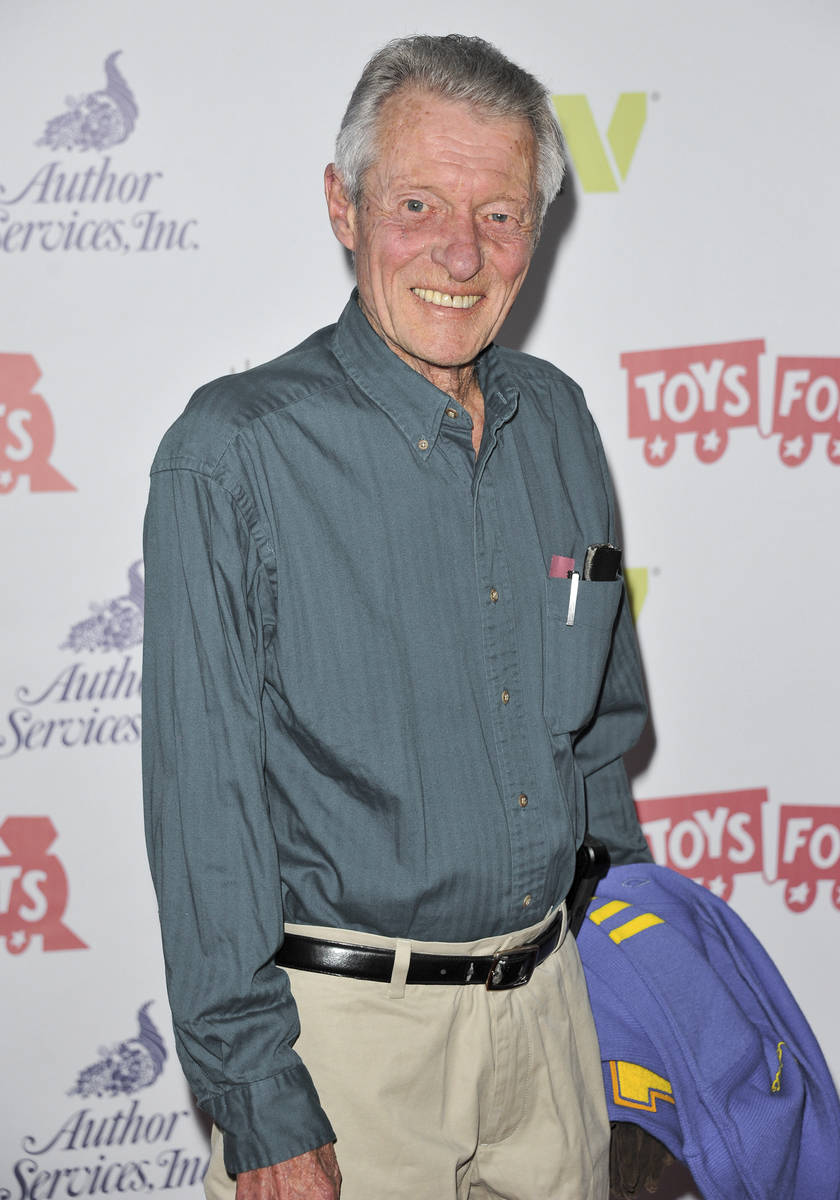 FILE - This Dec. 1, 2013 file photo shows Ken Osmond at the 82nd Annual Hollywood Christmas Par ...