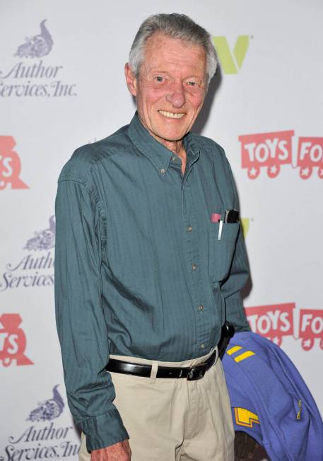 FILE - This Dec. 1, 2013 file photo shows Ken Osmond at the 82nd Annual Hollywood Christmas Par ...