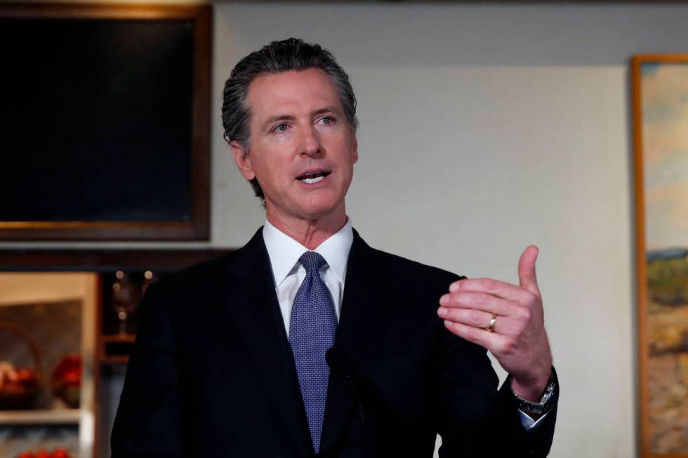 Gov. Gavin Newsom announces new criteria related to coronavirus hospitalizations and testing th ...