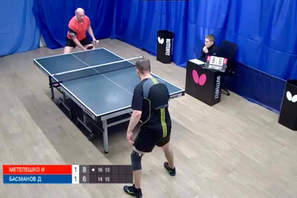 Igor Meteleshko (in red) takes on Dmitry Basmanov in a Moscow Liga Pro table tennis match Wedne ...