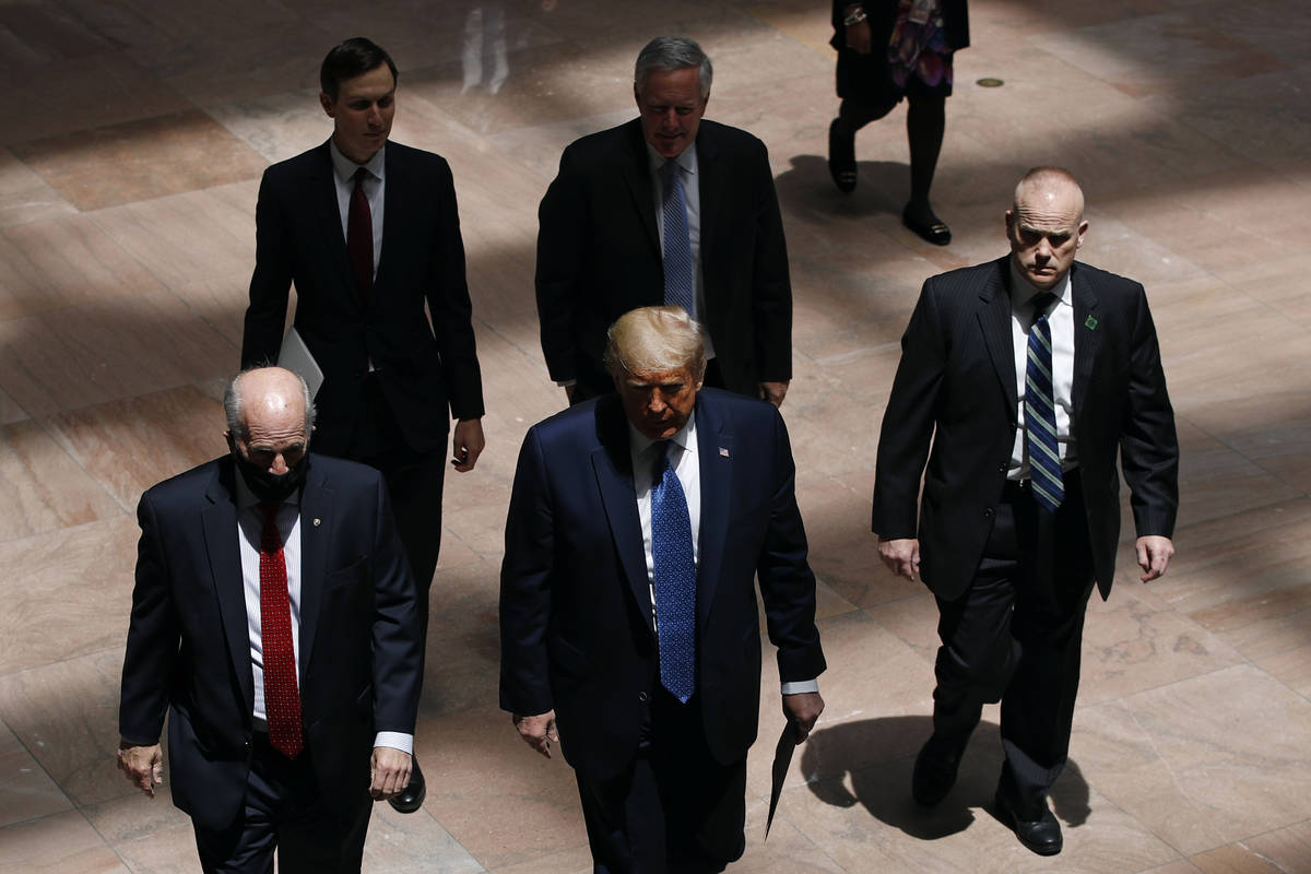 President Donald Trump arrives at the Hart Senate Office Building on Capitol Hill in Washington ...