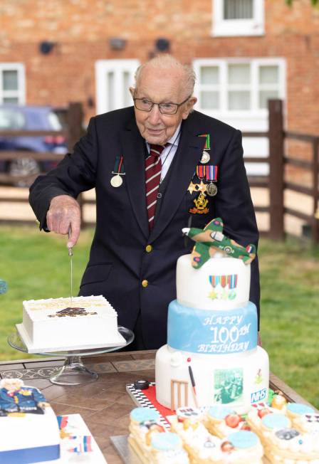 In this photo provided by Capture the Light Photography, Second World War veteran Captain Tom ...