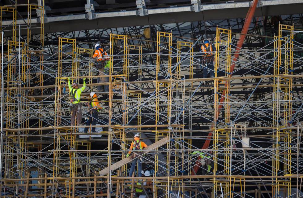 Crews at Allegiant Stadium begin to take down scaffolding on Tuesday, May 19, 2020, in Las Vega ...