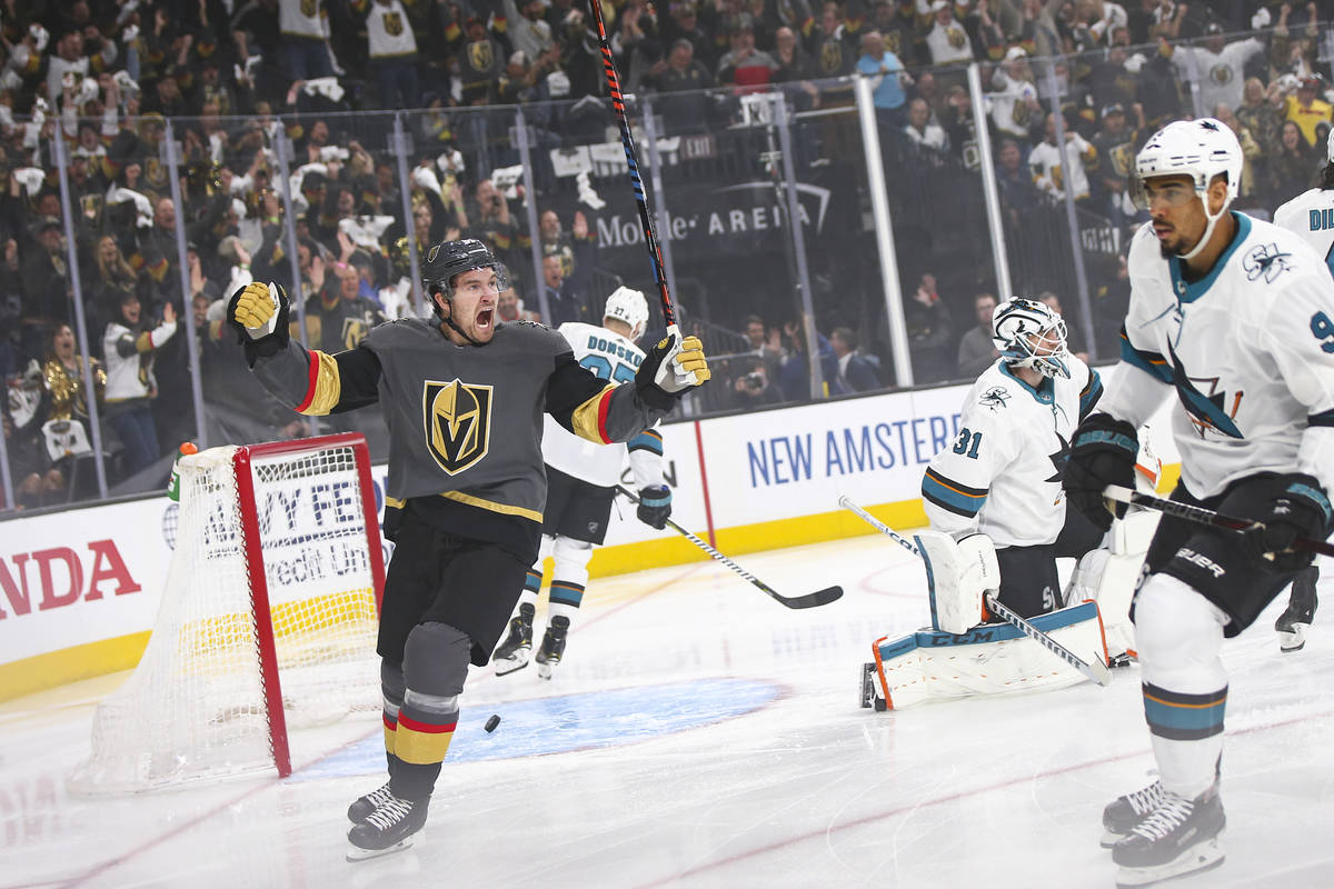 Golden Knights right wing Mark Stone (61) celebrates a goal by left wing Max Pacioretty, not pi ...