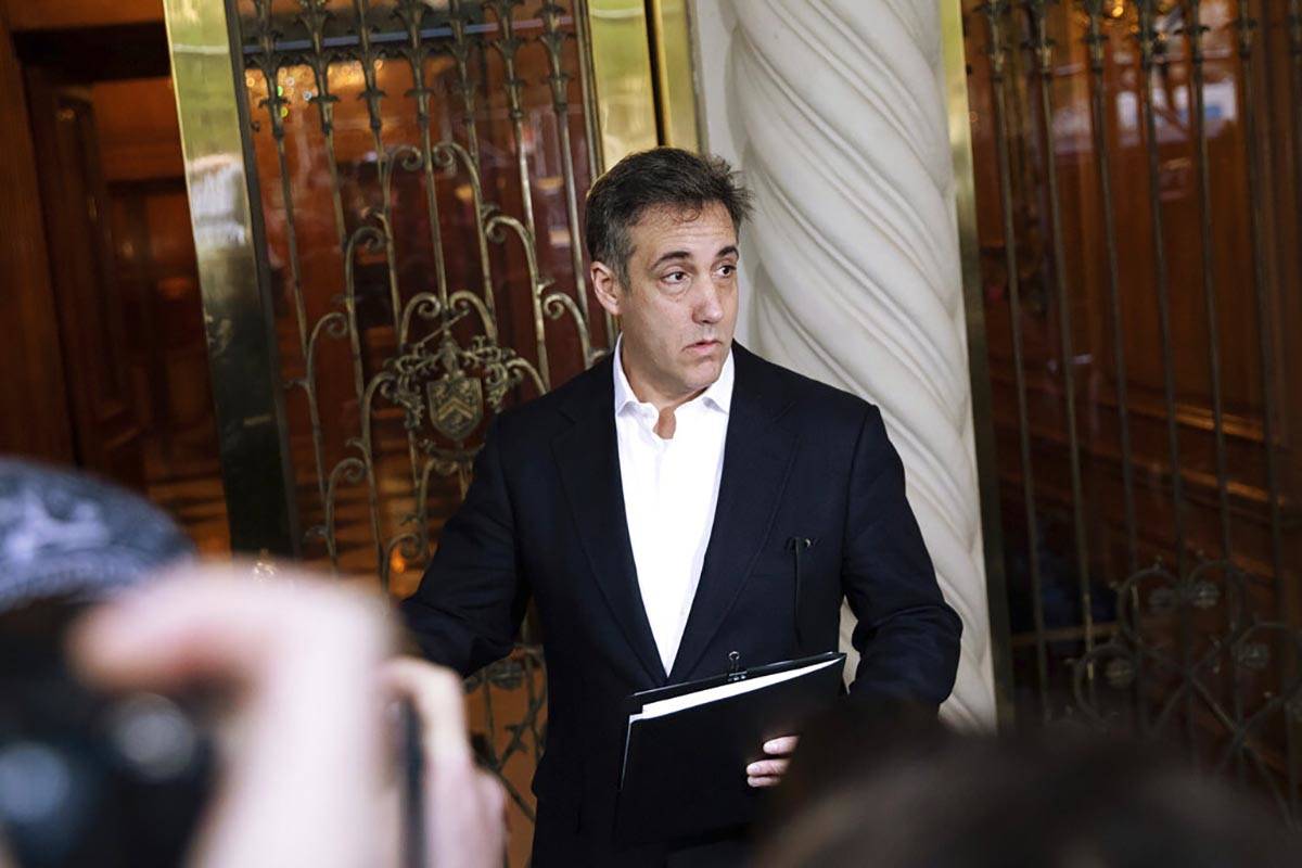 FILE - In this May 6, 2019, file photo Michael Cohen, former attorney to President Donald Trump ...