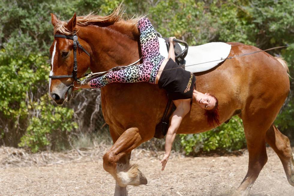 Gladius The Show performer Lisa Varmbo Martonovich performs acrobatic stunts on Thunder, a hors ...