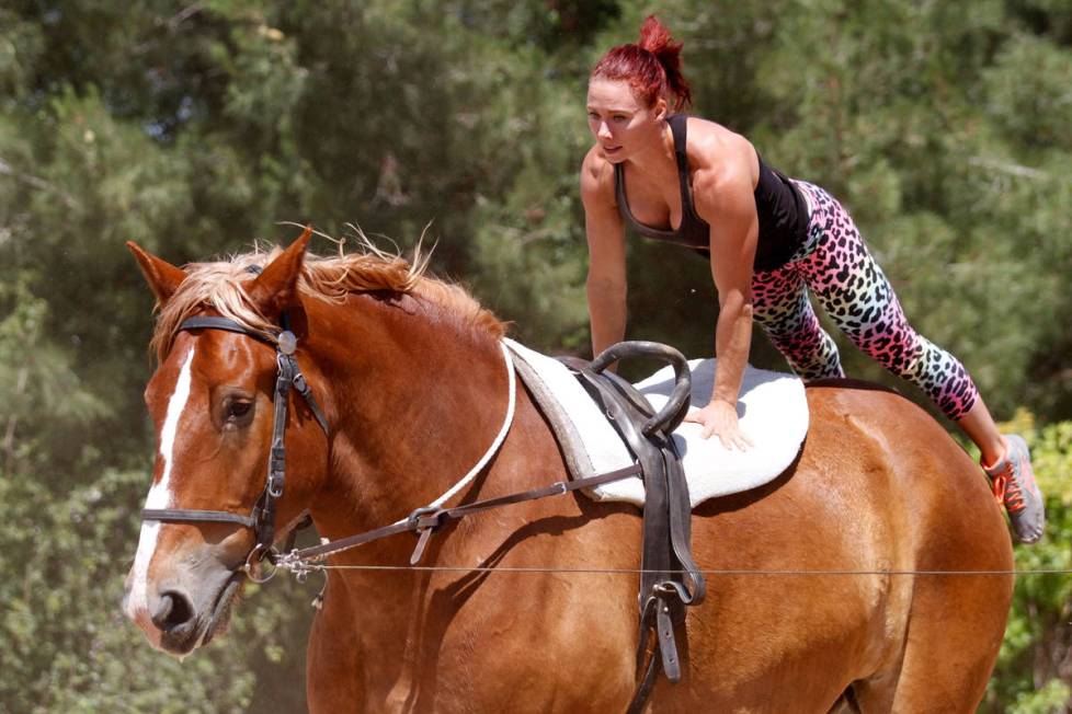 Gladius The Show performer Lisa Varmbo Martonovich performs acrobatic stunts on Thunder, a hors ...