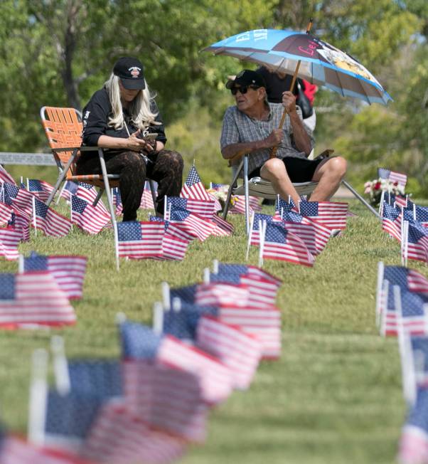 U.S. Army Pfc. Daniel Ventura, right, visits his wife Connie's grave site with his daughter, Lu ...