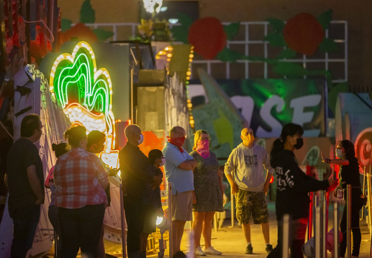 A group tours The Neon Museum on Friday, May 22, 2020, in Las Vegas. Friday was the first night ...