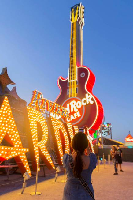 Kristine Bressel takes a photo during a tour at The Neon Museum on Friday, May 22, 2020, in Las ...