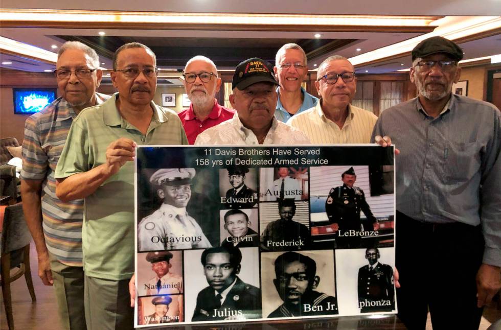FILE - In this July 12, 2019 file photo, from the left; Eddie Davis and his brothers Julius, Oc ...