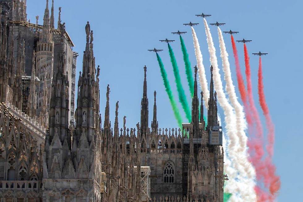 The Frecce Tricolori aerobatic squad of the Italian Air Force flies over Milan's Duomo cathedra ...